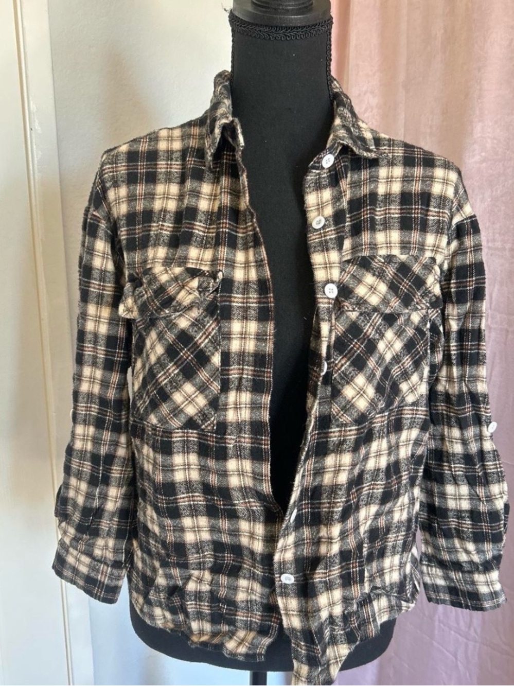 Black and cream plaid button-up flannel shirt